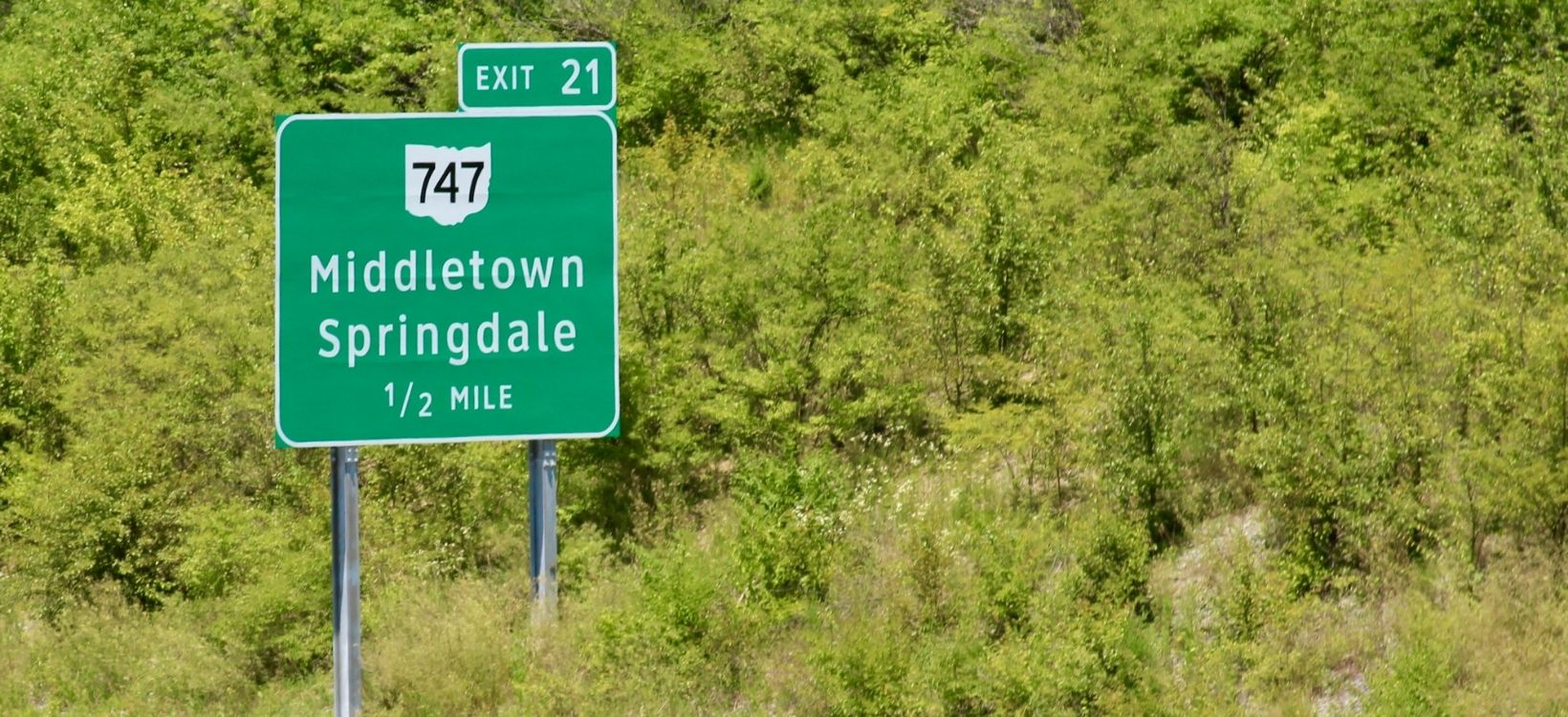Highway signs are a great way to tell roadside assistance operators where you're located in the event of a breakdown.